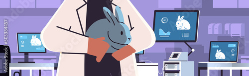 veterinary worker hands in gloves holding experimental rabbit scientist doing experiments in lab with biological genetic engineering research