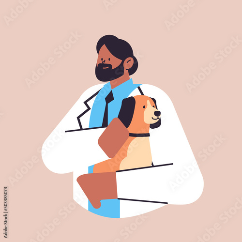 scientist or veterinary worker doing experiments in lab with experimental dog biological genetic engineering research
