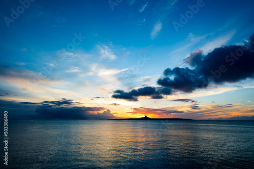 Beautiful sunset around the distant sea island