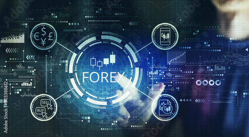 Forex trading concept with young man touching a digital screen at night