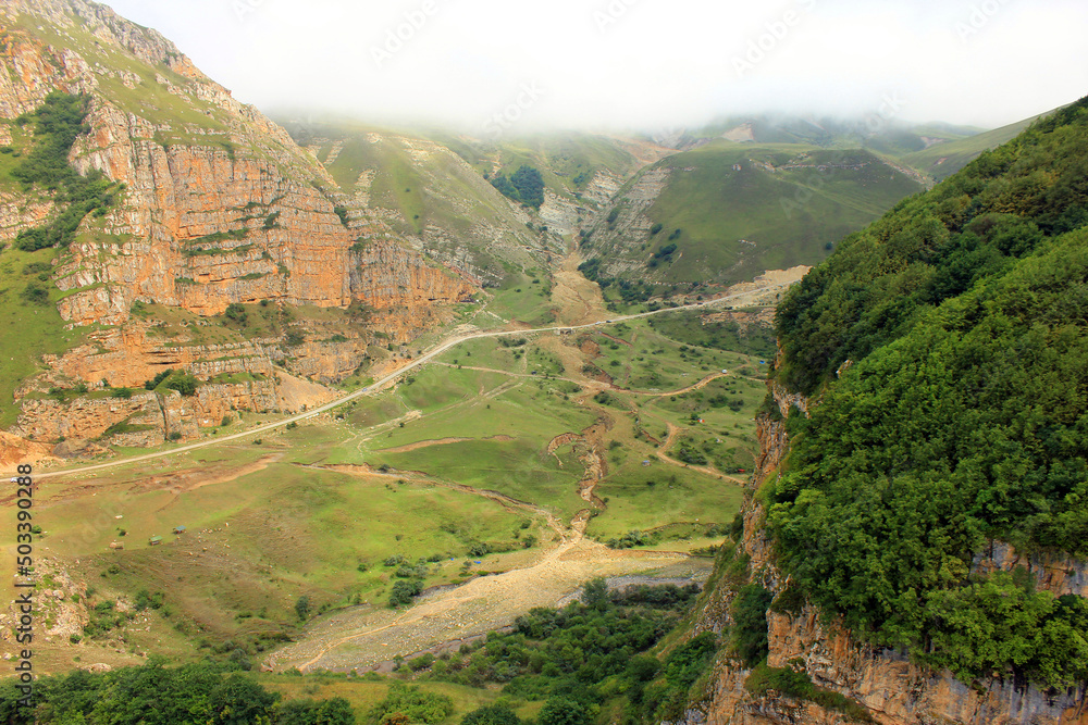 Red mountains in the gorge. The road to the village of Gryz. Guba region. Azerbaijan.