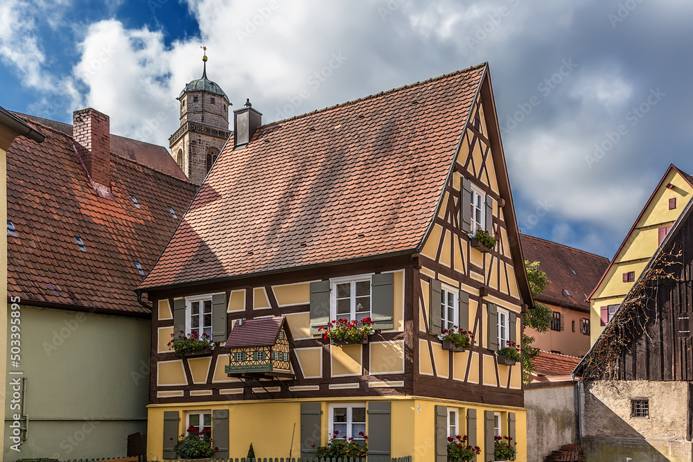 Dinkelsbühl, Germany. Half-timbered house, decorated with a small copy of itself Dinkelsbühl, Germany. Half-timbered house, decorated with a small copy of itself