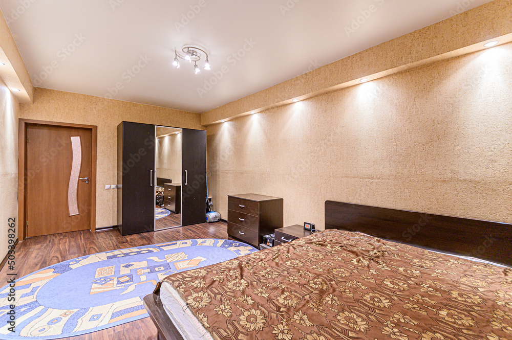 Fototapeta premium Russia, Moscow- May 21, 2020: interior apartment room bedroom with bed