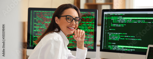 Young female programmer wor...