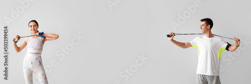 Sporty young woman with ski...