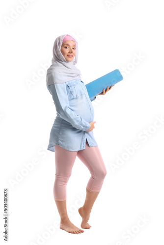 Pregnant Muslim woman with ...