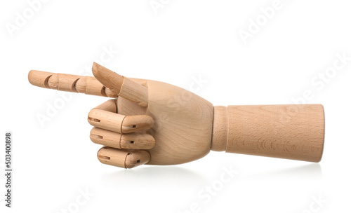 Wooden hand pointing at something on white background photo