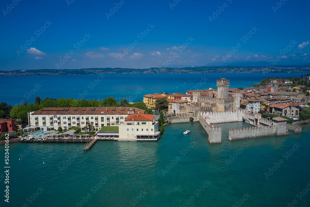 Aerial view on Sirmione sul Garda. Italy, Lombardy. Rocca Scaligera Castle in Sirmione. View by Drone.