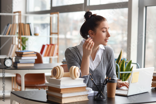 Beautiful young woman study...