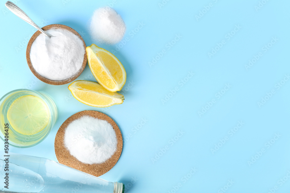 Composition with glass of water, baking soda and lemon on color background Composition with glass of water, baking soda and lemon on color background