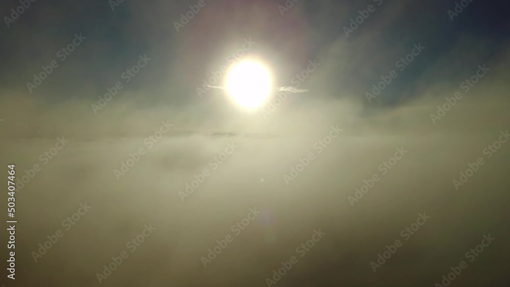 round hot sun behind the clouds, solar system background, stock nature video round hot sun behind the clouds, solar system background, stock nature video