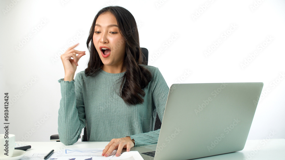 Cheerful freelance Asian woman thinking get idea work using laptop pc on desk over white background. Student young girl use computer think something comfortable network online over isolated.Technology Cheerful freelance Asian woman thinking get idea work using laptop pc on desk over white background. Student young girl use computer think something comfortable network online over isolated.Technology
