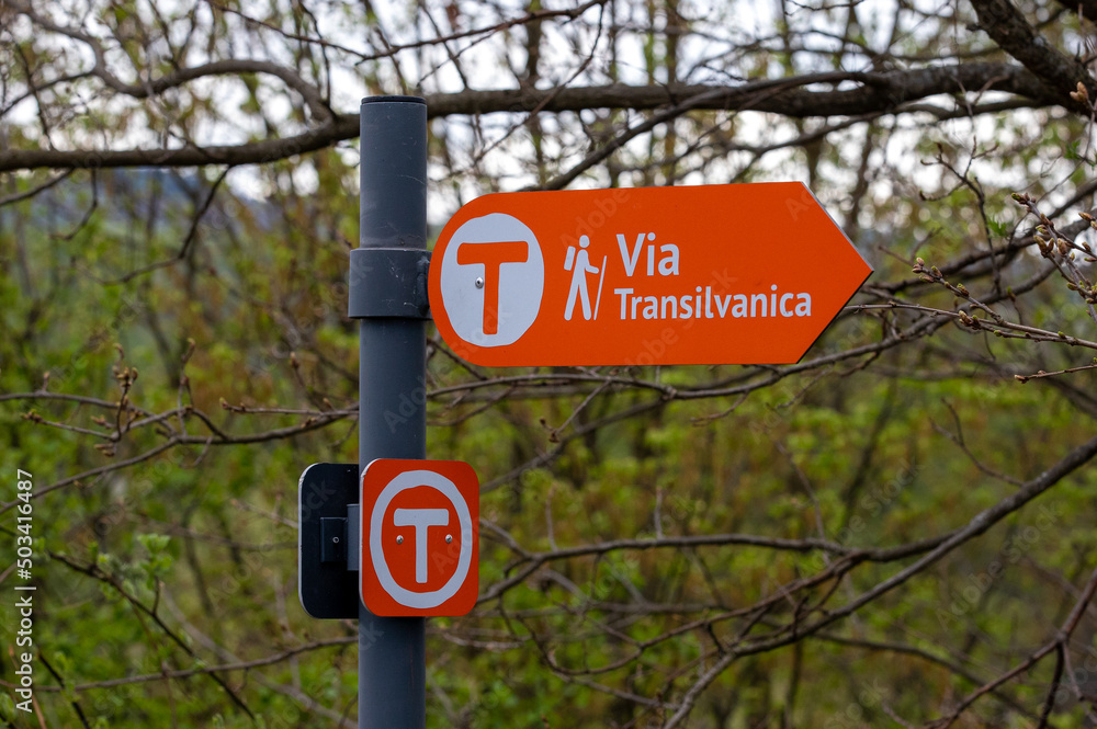 a close-up with Via Transilvanica tourist indicator in Romania