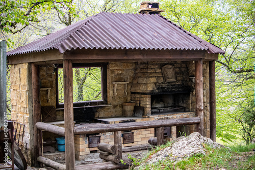 outdoor kitchen with stove and barbecue for cooking in the mountains