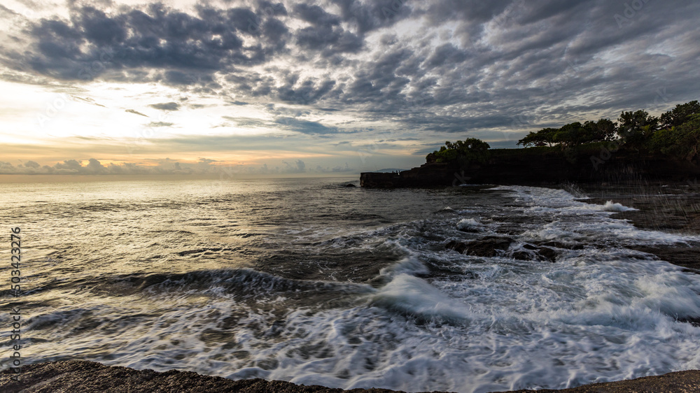 Breathtaking sunset in Bali near Tanah Lot temple, Indonesia Breathtaking sunset in Bali near Tanah Lot temple, Indonesia