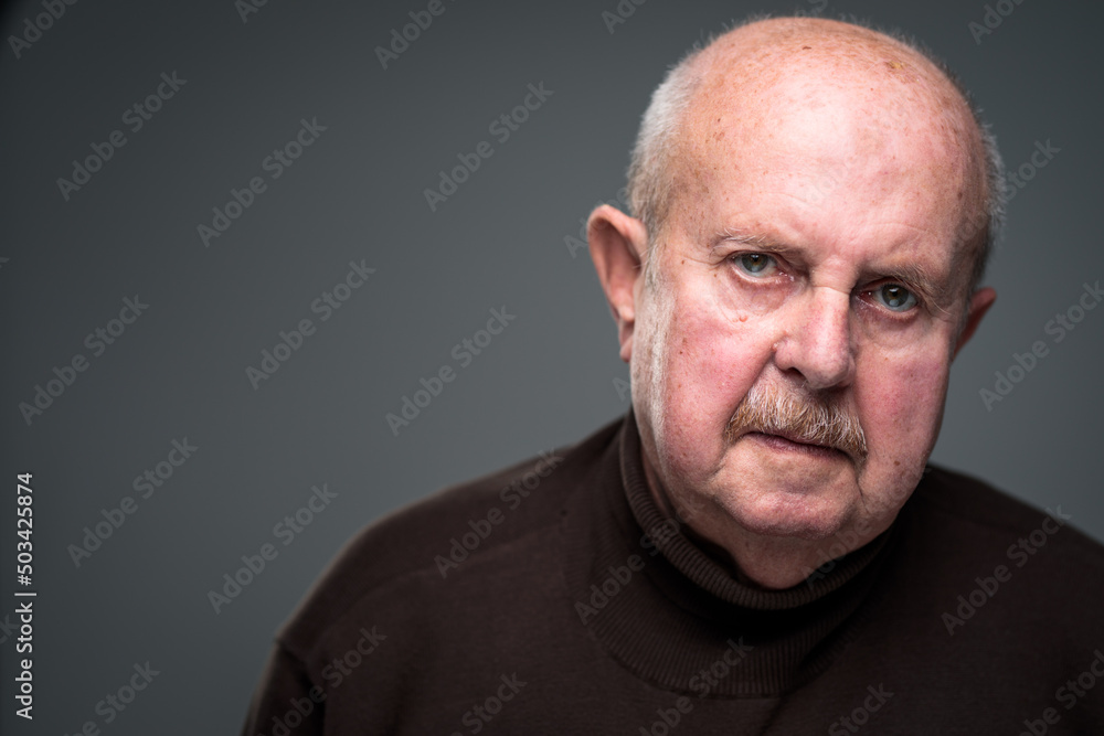Senior man lonely at home, anxious/afraid to go out - self isolation/ quarantine due to COVID-19/ Coronavirus social distancing/prevention concept Senior man lonely at home, anxious/afraid to go out - self isolation/ quarantine due to COVID-19/ Coronavirus social distancing/prevention concept