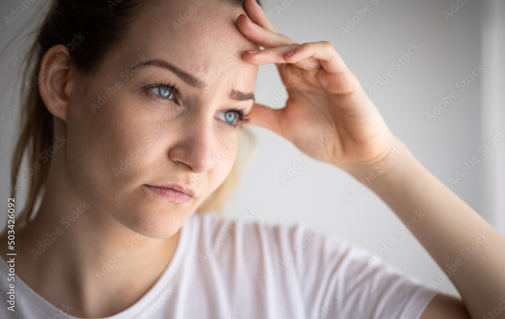 Anxious, worried, stressed young woman looking pensive, pondering, deep in thoughts. Anxious, worried, stressed young woman looking pensive, pondering, deep in thoughts.