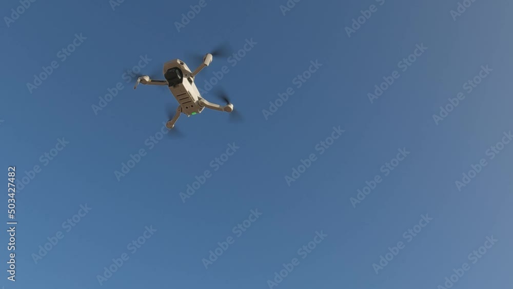 Security cameras. Surveillance technology. Drone flies over skies. Modern fun. Remotely pilot drone for entertainment. Security cameras. Surveillance technology. Drone flies over skies. Modern fun. Remotely pilot drone for entertainment.