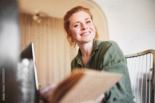 Smiling woman looking at camera