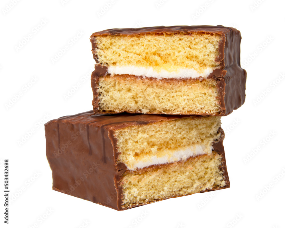 Biscuit cake with cream filling glazed chocolate isolated on the white Biscuit cake with cream filling glazed chocolate isolated on the white