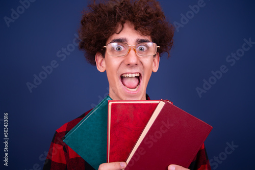 Funny man with different books.