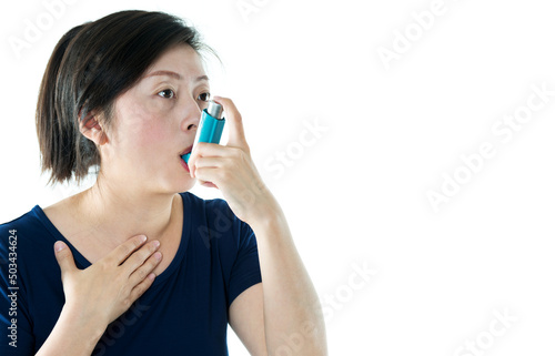 Young asian woman using asthma inhaler isolated on white background