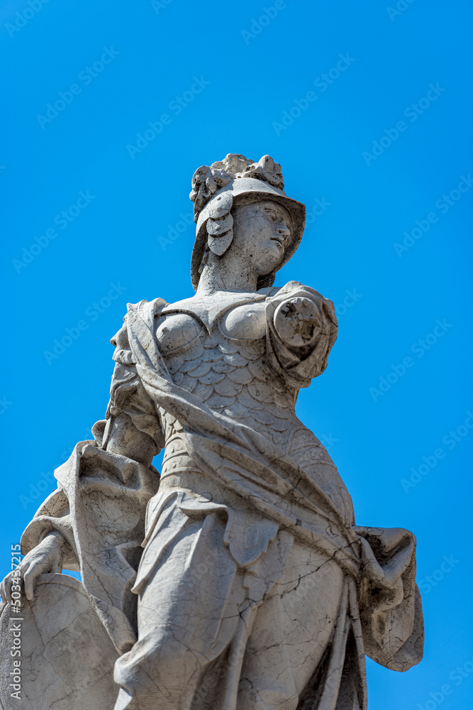 Brescia. Closeup of the marble statue and fountain of Brescia Armata (Brescia Armed) by the Italian sculptor Antonio Calegari (1699-1777). Square Piazza Paolo VI or Piazza del Duomo. Lombardy, Italy. Brescia. Closeup of the marble statue and fountain of Brescia Armata (Brescia Armed) by the Italian sculptor Antonio Calegari (1699-1777). Square Piazza Paolo VI or Piazza del Duomo. Lombardy, Italy.