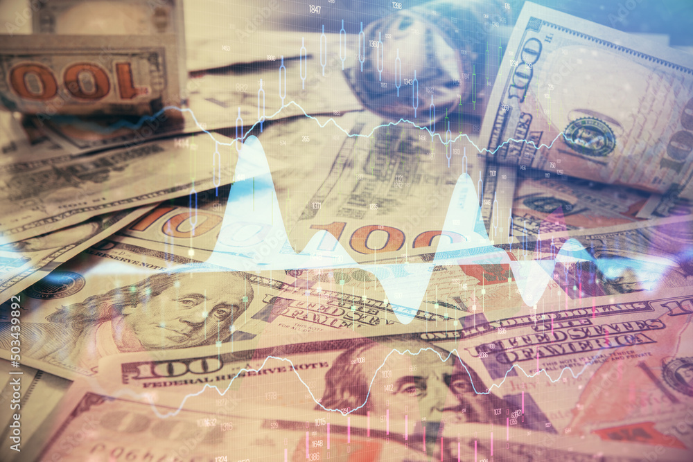 Multi exposure of forex chart drawing over us dollars bill background. Concept of financial success markets. Multi exposure of forex chart drawing over us dollars bill background. Concept of financial success markets.