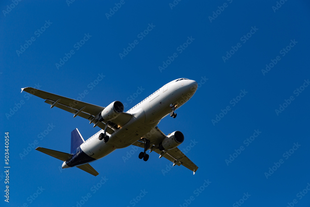 Airplane flying in the blue sky. Airplane flying in the blue sky.