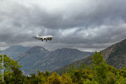 White airplane landing in Dubrovnik airport  Cavtat .