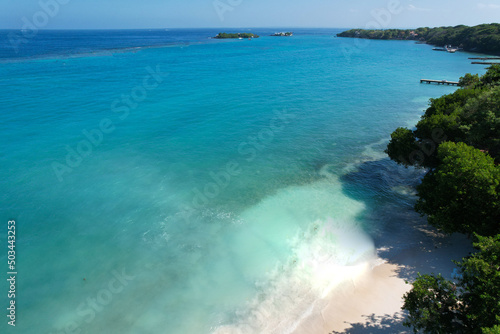 Aerial drone view of beautiful turquoise water beach