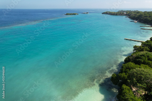 Aerial drone view of beautiful turquoise water beach