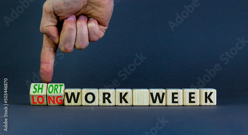 Short or long work week symbol. Businessman turns cubes and changes concept words Long work week to Short work week. Beautiful grey background. Business short or long work week concept. Copy space.