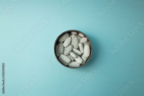 Pills on a blue background