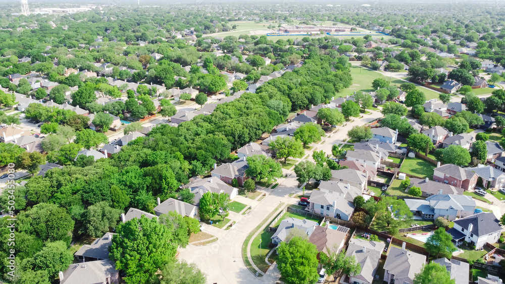 Residential house in natural settings with lush green and grass land to horizontal line in Flower Mound, Texas, USA