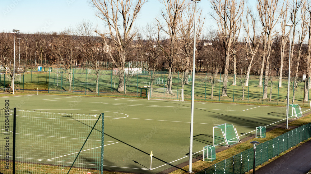 Obraz premium Empty Football Pitch In City. Playground For Football. Soccer Field For Trainings And Games
