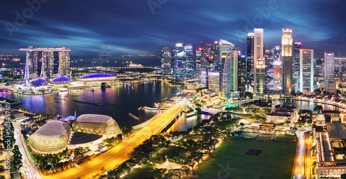 Photography Aerial view of Singapore business district and city at twilight in Singapore, As