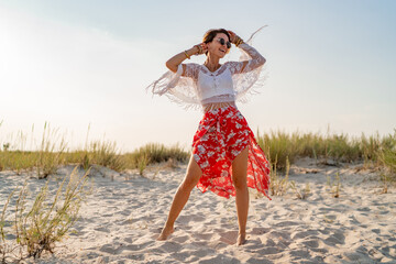 stylish attractive slim smiling woman on beach in summer style fashion trend outfit