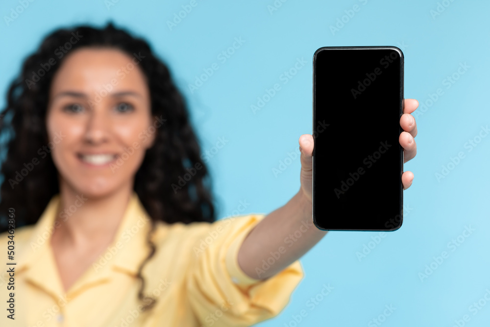Closeup of lady holding showing black empty smart phone screen Closeup of lady holding showing black empty smart phone screen