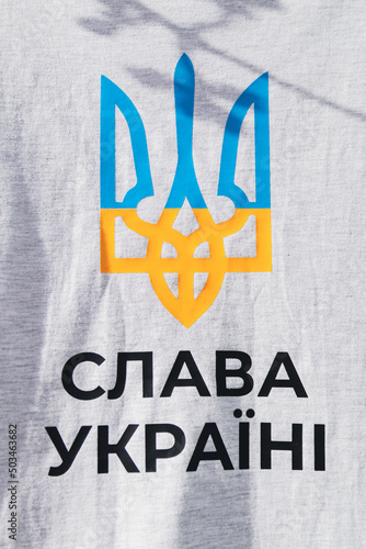 Ukrainian trident in yellow and blue inscription 