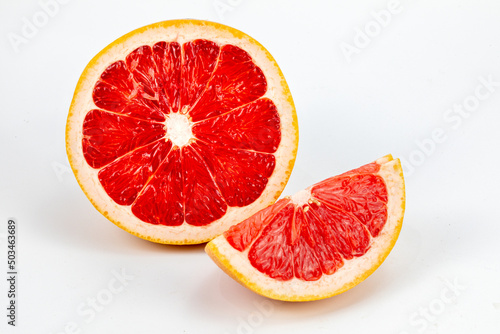Fresh Grapefruit Blood orange - a variety of orange with crimson, almost blood-colored flesh, Citrus into sinensis, raspberry orange, with crimson, isolated in white background with copy space