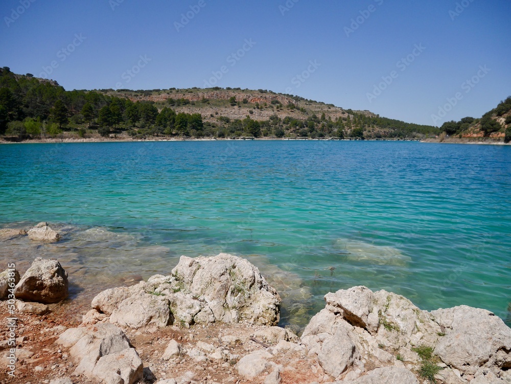 Turquoise blue water in Laguna de Ruidera nature park. Castile La Mancha, Spain.