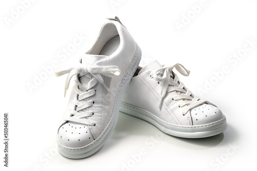 Pair of Stylis New White Sneakers Over White Background. Horizontal Image