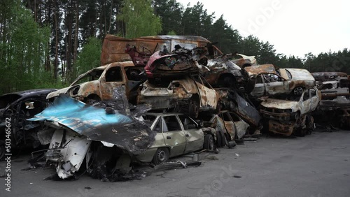 Irpen/Ukraine - 7.05.2022: Shoted and burned cars of civilians who tried to evacuate to escape Russian occupation