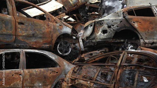 Irpen/Ukraine - 7.05.2022: Shoted and burned cars of civilians who tried to evacuate to escape Russian occupation