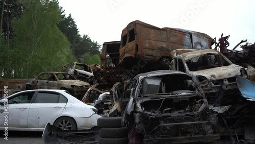 Irpen/Ukraine - 7.05.2022: Shoted and burned cars of civilians who tried to evacuate to escape Russian occupation