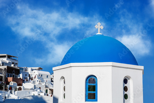 The traditional greek blue dome of the orthodox church with blue sky background.