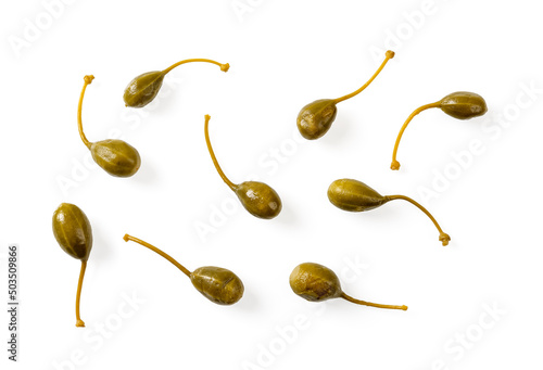 Set of pickled caper berries isolated on white background. Cutout of marinated caper fruit variety. Marinated caperberry for condiment and garnish concepts. Mediterranean cuisine ingredient. photo