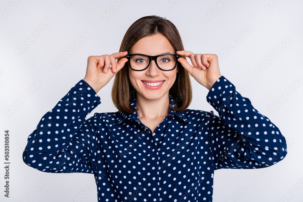 Photo of young pretty woman confident boss recruiter wear eyeglasses isolated over grey color background Photo of young pretty woman confident boss recruiter wear eyeglasses isolated over grey color background