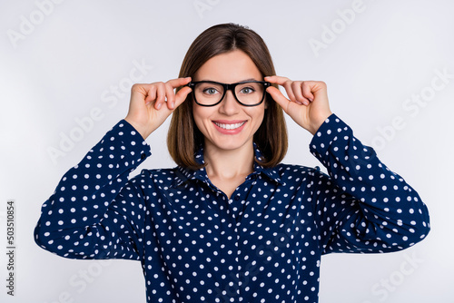 Photo of young pretty woman confident boss recruiter wear eyeglasses isolated over grey color background